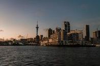Atmospheric dusk view of Auckland skyline over the harbor