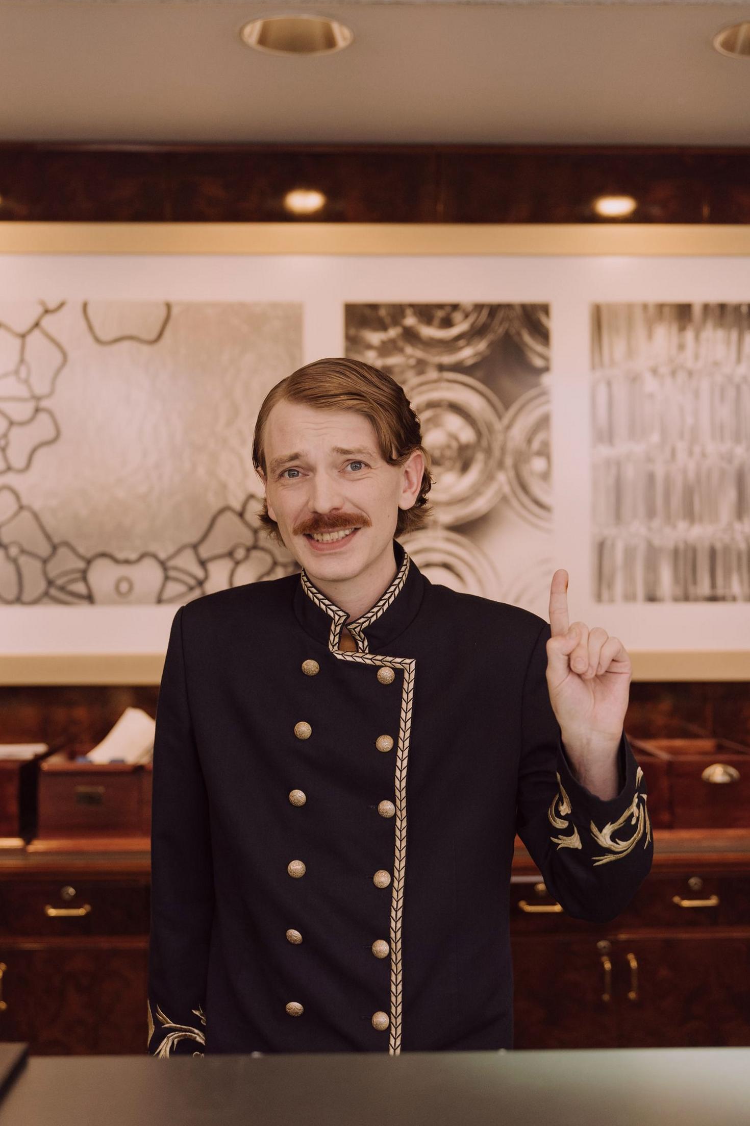 Friendly Blissflash Hotel team member
